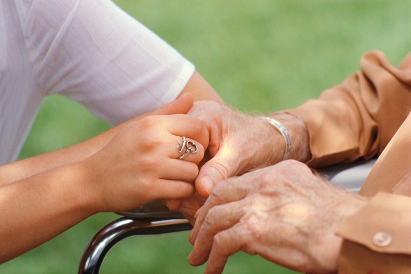 Image of couple holding hands